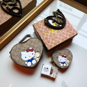 CrossBody Corazon Coach (se envia surtido)