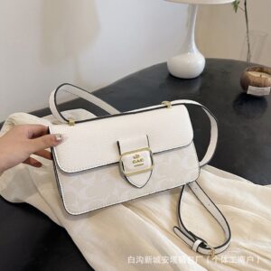 Bolsa Coach Broche (se envia surtido)